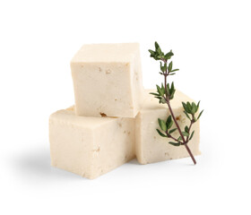 Pieces of delicious tofu cheese isolated on white background