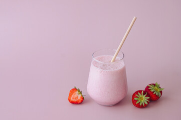 Delicious strawberry milkshake with fresh strawberries