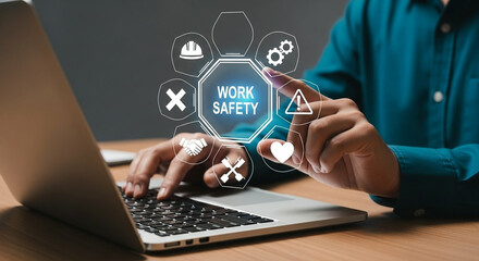 Person using laptop to access work safety information