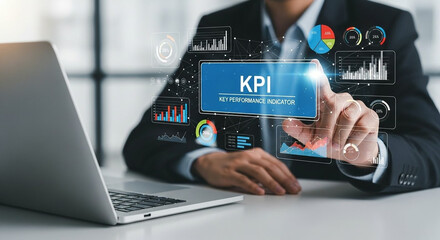 Fototapeta premium Businessperson analyzing kpi data on laptop