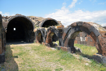 Ruins of an old castle. Old architecture. Arches in construction. Ancient culture