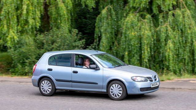 Milton Keynes,Bucks,UK - June 22nd 2025:  2006 Nissan Almera car driving on a British road