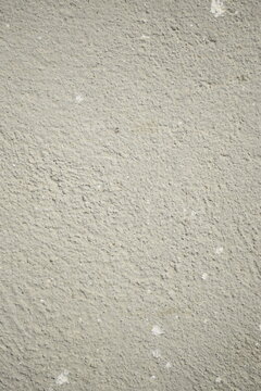 Textura de reboco de cimento &aacute;spero. Piso acimentado de &aacute;rea externa de casa brasileira, ch&atilde;o de cal&ccedil;ada inacabada