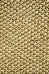 Textura de sisal natural trançado. Tapete de palha de sisal amarelo com fibras naturais com linhas...