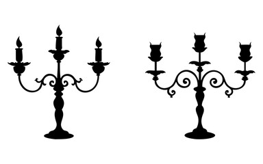 Set of three candle candelabra full black silhouette vector illustration design