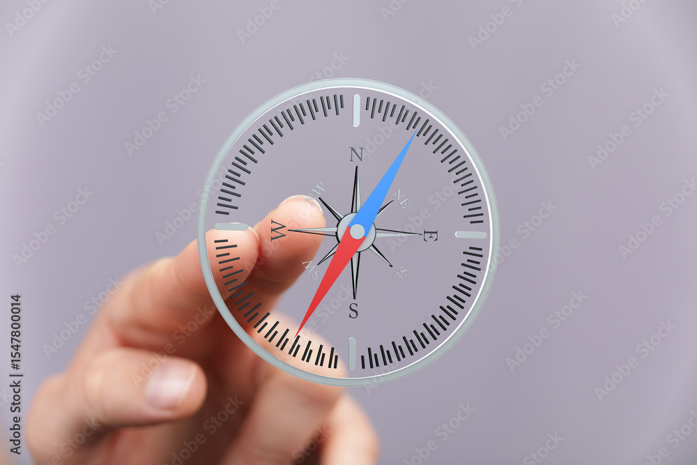Poster Person using a digital compass for navigation.  Find your way.