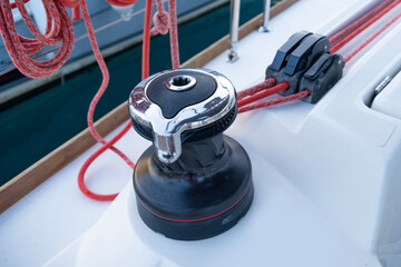 Yacht winch detail, sailing equipment, boat rigging, nautical, water transport, instrument marine travel, winch for efficient sailing maneuvers
