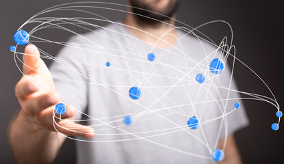 Abstract image of a man connecting with a digital network.  Ideal for technology, communication, and networking concepts.
