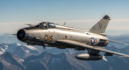 Vintage jet aircraft soaring above snow-capped mountains under a clear blue sky depicting aviation and aerial flight
