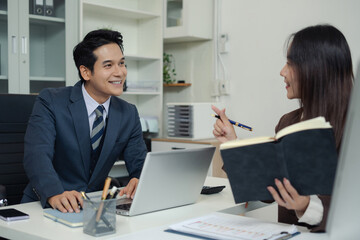 Businessmen team or financial data analysts working with tablets and laptop computers and data graphs together. Plan to analyzing projects in the office.