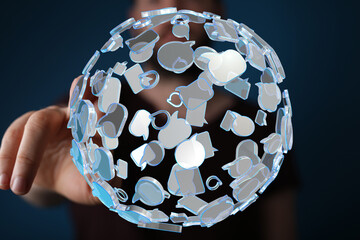 Abstract image of a person interacting with a sphere of communication speech bubbles.  Represents...