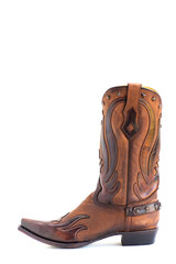 Timeless Western Elegance. Fashion-forward leather boot with heritage-inspired patterns. on white background.