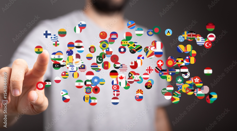 Aufkleber Image of a person interacting with a digital display of world flags, representing global connectivity.