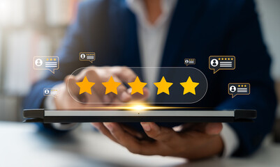 Consumer use tablet to complete online customer satisfaction survey, rating 5 stars for excellent...