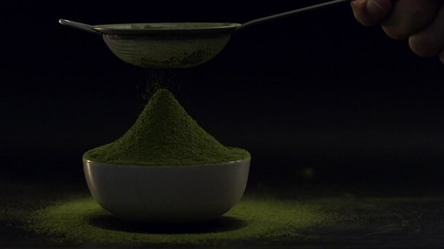 Sift matcha powder with a fine sieve. Taken with a high-resolution macro lens.