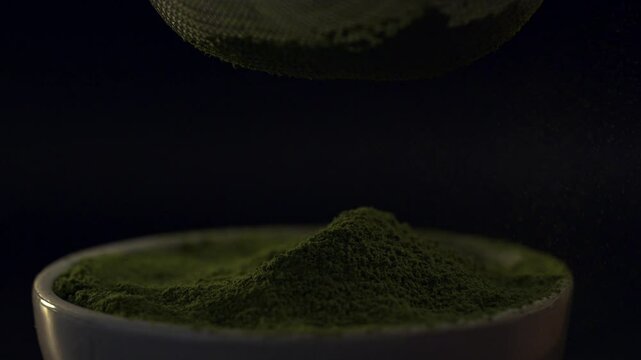 Sift matcha powder with a fine sieve. Taken with a high-resolution macro lens.