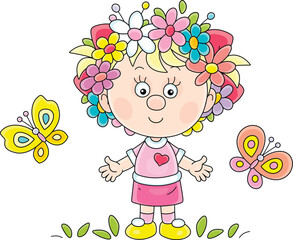 Happy little girl with a flower wreath on her head and funny butterflies fluttering around, vector cartoon illustration on a white background
