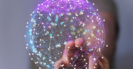 Abstract image of a hand interacting with a digital sphere representing global network connections...