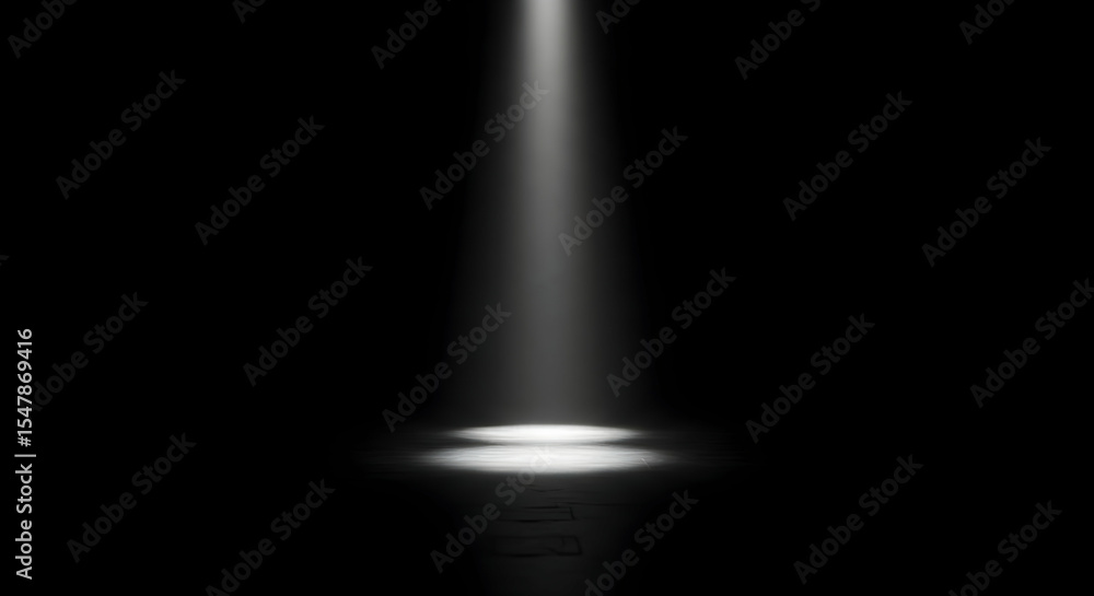 Poster spotlight illuminating dark floor in theater setting