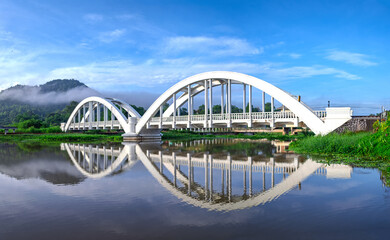 Beautiful landscape, white and pink bridge, Bangkok-Chiang Mai railway line, beautiful landmark of Lamphun province, Thailand