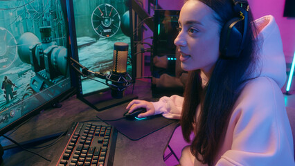 Caucasian addicted dependence female gamer girl woman streamer play at computer internet virtual...