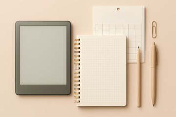 Minimalist workspace with digital tablet, spiral notebook, calendar, pencil, and pen in neutral colors on beige background