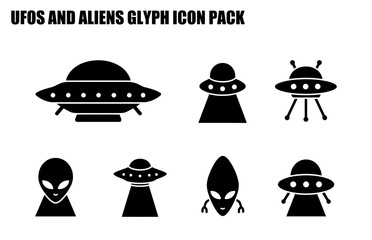 Black and white graphic icons of UFOs and aliens in a flat design. Simple illustrations of a variety of spaceship/UFOs and alien/extraterrestrial figures.