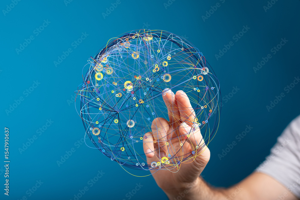 Aufkleber Abstract image of a hand interacting with a digital sphere representing global network connections.