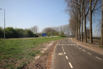 Meadows, fields and roads in the Middengebied area where new village Cortelande will arise