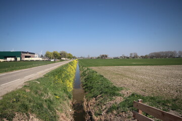 Meadows, fields and roads in the Middengebied area where new village Cortelande will arise