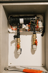 Indoor heating system maintenance with tools and pipes