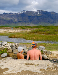 Relaxing in Landbrotalaug Hot Spring surrounded by stunning Icelandic landscapes