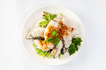 Steamed sea bass with dipping sauce