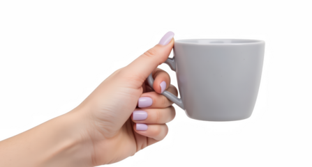 Hand holding gray coffee cup with smooth surface and minimalist design. soft pastel color of cup complements elegant hand