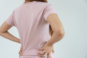 woman holding back while and suffer from unbearable pain health and problems, chronic back pain,...