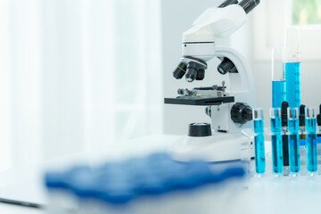 Scientist analyze biochemical samples in advanced scientific laboratory. Medical professional use...