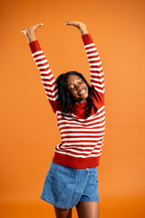 Arms Raised in the Studio