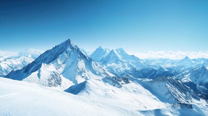 Majestic Snowy Peaks Under Clear Blue Sky in Mountain Landscape