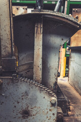 Rusty gears and mechanisms reveal the artistry of vintage machinery in a bustling workshop filled with tools and creativity