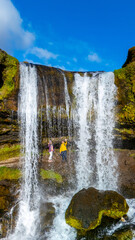 Majestic Seljalandsfoss waterfall in Iceland reveals natural beauty amidst adventurous exploration