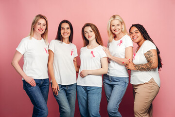 Diverse group of women showing support for breast cancer awareness