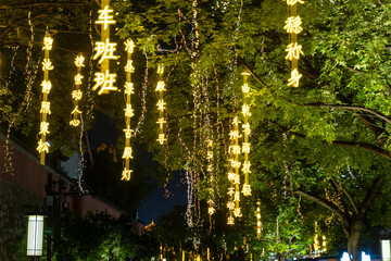 Glowing lanterns in a peaceful night street