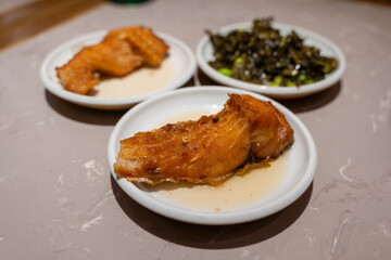 Delicious roasted dish on small plates