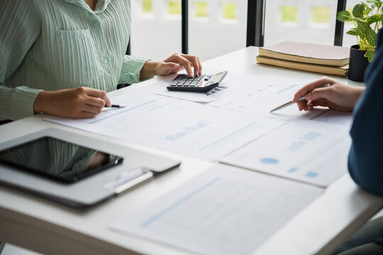 Solar panels green energy Business people working in green eco friendly office business meeting creative ideas for business eco friendly professional teaching corporate people sustainable electricity - Powered by Adobe