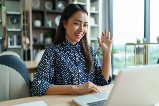 Asian Businesswoman VDO Call Conference Work  talk chat online  video call on laptop webcam conference working with laptop online briefing E learning and social distancing concept