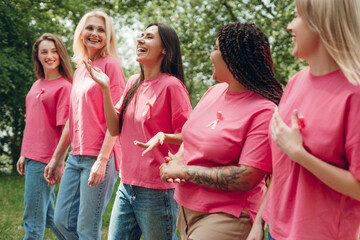 Diverse women walking together in support of breast cancer awareness
