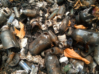 Small Burnt Glass Bottles  Post-Fire Debris and Waste Texture