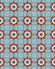 This seamless pattern showcases vivid floral designs interspersed with geometric shapes, perfect for textile or graphic applications