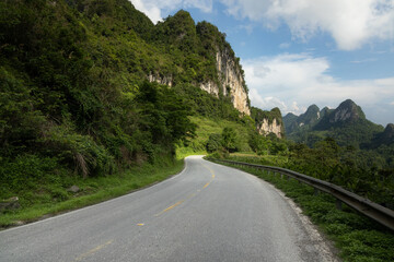 Winding road among limestone karst mountains landscape of Cao Bang district in northern Vietnam