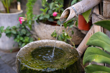 Tranquil garden with bamboo water spout